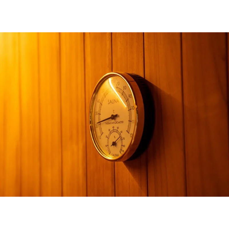 Thermometer on a wooden sauna wall