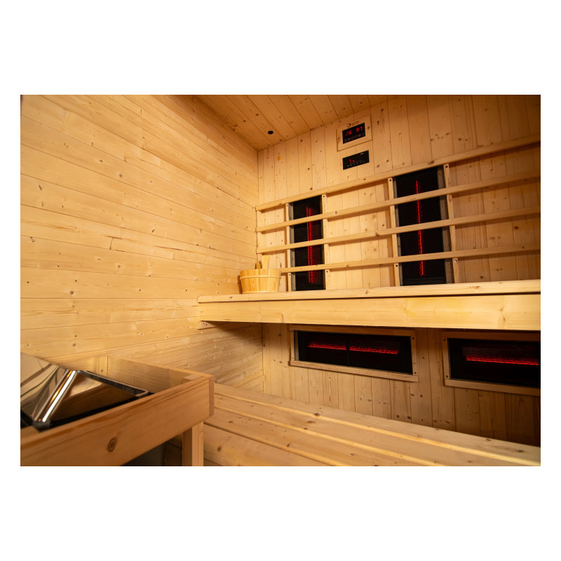 Spruce mixed sauna with infrared panels on the wall.
