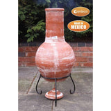 Back View On Gardeco Large Sol Mexican Chiminea In Rustic Orange With Burning Logs Inside | SKU: C21SL.37 | Barcode: 5031599045481