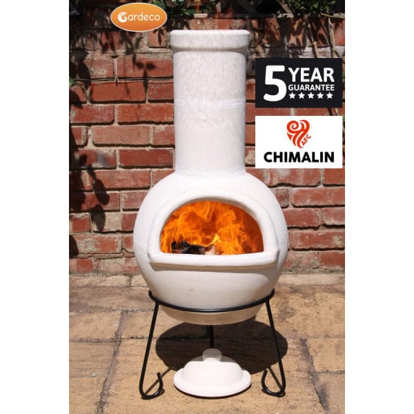 Gardeco Sempra Large Chimalin AFC Chiminea In Natural Clay With Burning Logs Inside In A Sunny Garden Setting | SKU: AFC-C21.00 | Barcode: 5031599044569