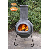 Gardeco Linea XL Mexican Chimenea In Grey With Fuel Inside In A Sunny Garden Setting | SKU: C6L.46 | Barcode: 5031599047362