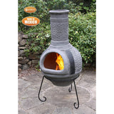 Gardeco Linea XL Mexican Chimenea In Grey With Fuel Inside In A Sunny Garden Setting | SKU: C6L.46 | Barcode: 5031599047362