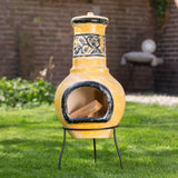 RedFire Soledad Clay Chiminea / Outdoor Fireplace In Yellow & Black In A Beautiful Sunny Garden Setting | SKU: 411835 | Barcode: 8718801854730