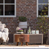 RedFire Fulla Firepit In Rust Colour With Logs Inside In An Outdoor Setting | SKU: 420302 | UPC: 8718801857489 | Weight: 20kg