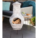 RedFire Acopulco Clay Chiminea / Outdoor Fireplace In Grey In A Garden Setting | SKU: 411836 | Barcode: 8718801854747