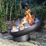 Esschert Design Black Steel Sloping Fire Bowl With Burning Logs In A Garden Setting | SKU: 422496 | UPC: 8714982142727